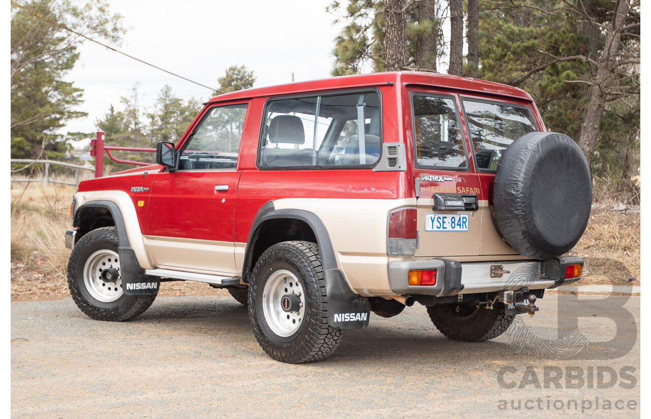 10/1994 Nissan Patrol ST SWB Series 2 (4x4) KY60 GQ 2d Hardtop Big Red / Desert Sand 4.2L