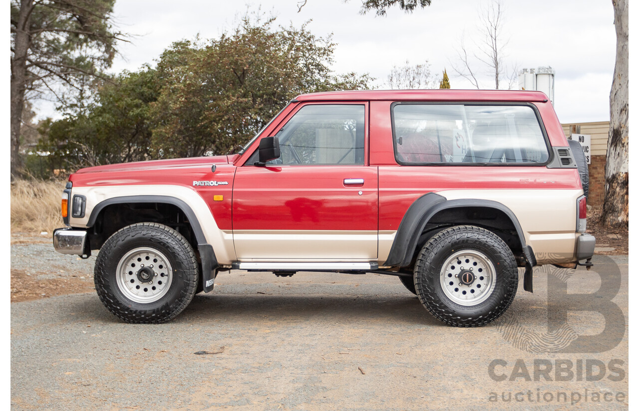 10/1994 Nissan Patrol ST SWB Series 2 (4x4) KY60 GQ 2d Hardtop Big Red / Desert Sand 4.2L