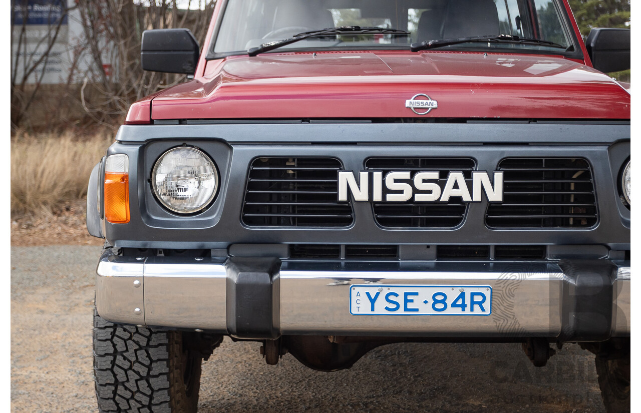 10/1994 Nissan Patrol ST SWB Series 2 (4x4) KY60 GQ 2d Hardtop Big Red / Desert Sand 4.2L