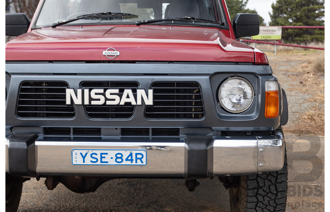 10/1994 Nissan Patrol ST SWB Series 2 (4x4) KY60 GQ 2d Hardtop Big Red / Desert Sand 4.2L