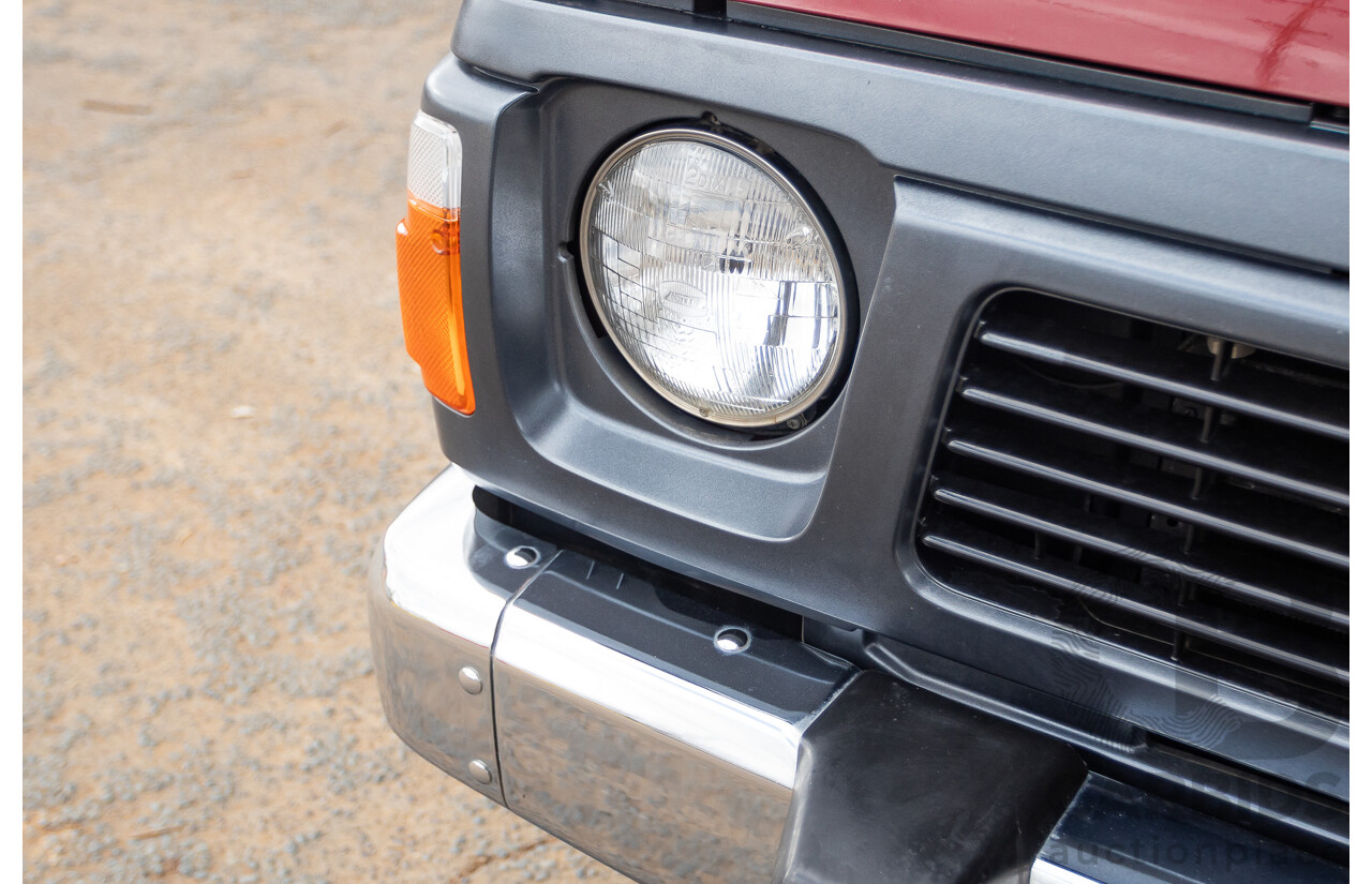 10/1994 Nissan Patrol ST SWB Series 2 (4x4) KY60 GQ 2d Hardtop Big Red / Desert Sand 4.2L