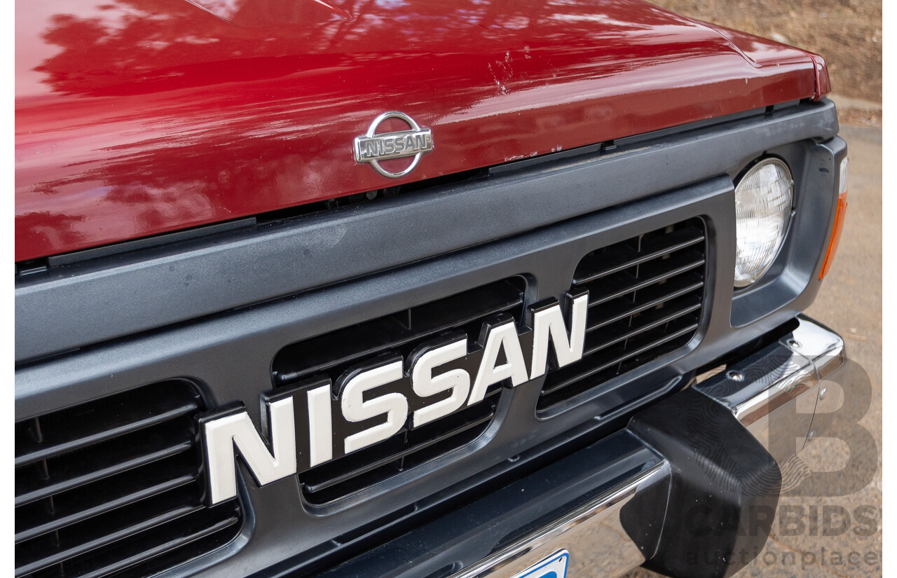 10/1994 Nissan Patrol ST SWB Series 2 (4x4) KY60 GQ 2d Hardtop Big Red / Desert Sand 4.2L