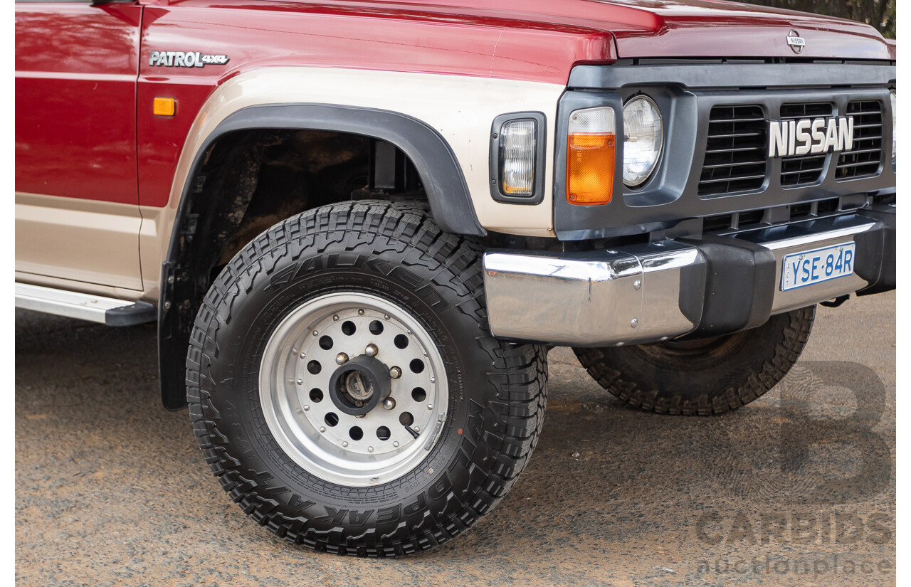 10/1994 Nissan Patrol ST SWB Series 2 (4x4) KY60 GQ 2d Hardtop Big Red / Desert Sand 4.2L