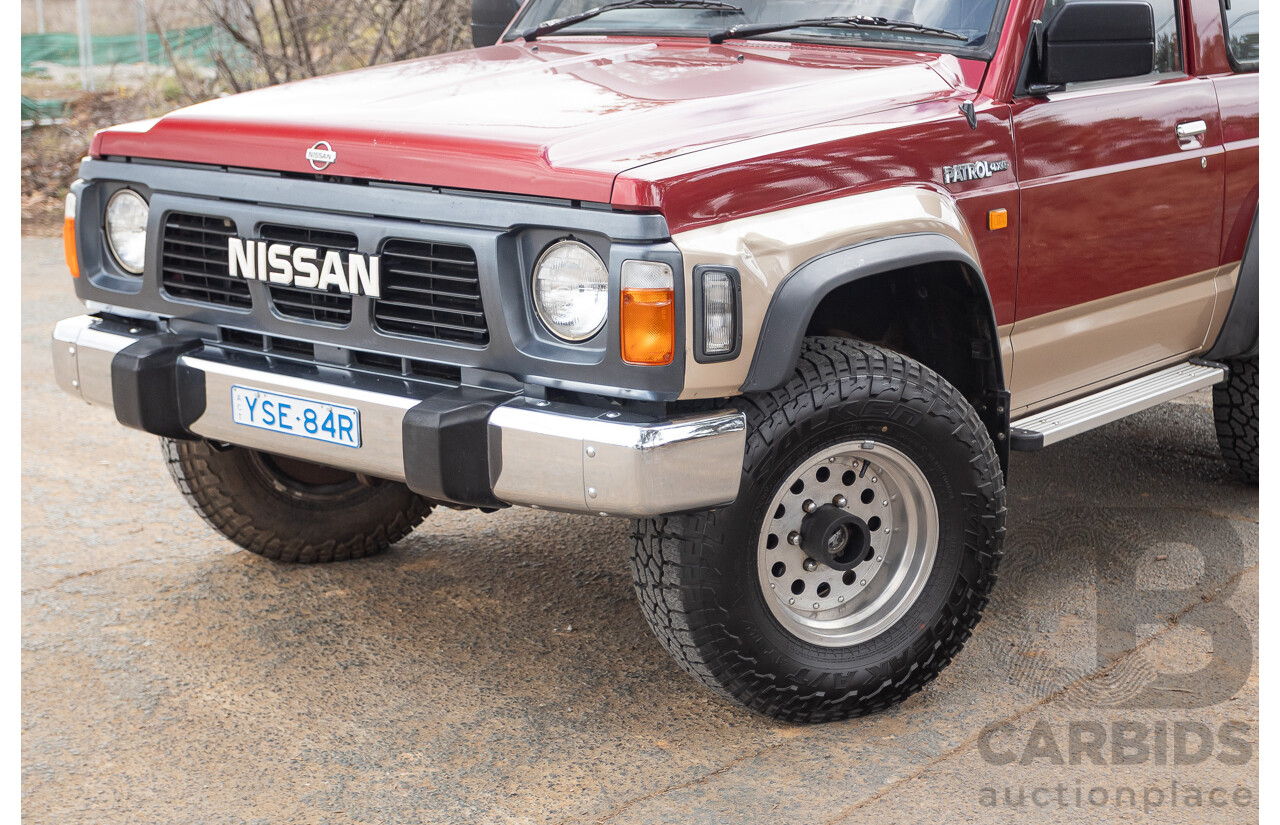 10/1994 Nissan Patrol ST SWB Series 2 (4x4) KY60 GQ 2d Hardtop Big Red / Desert Sand 4.2L