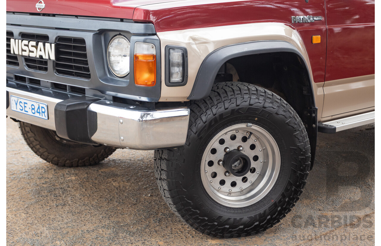 10/1994 Nissan Patrol ST SWB Series 2 (4x4) KY60 GQ 2d Hardtop Big Red / Desert Sand 4.2L