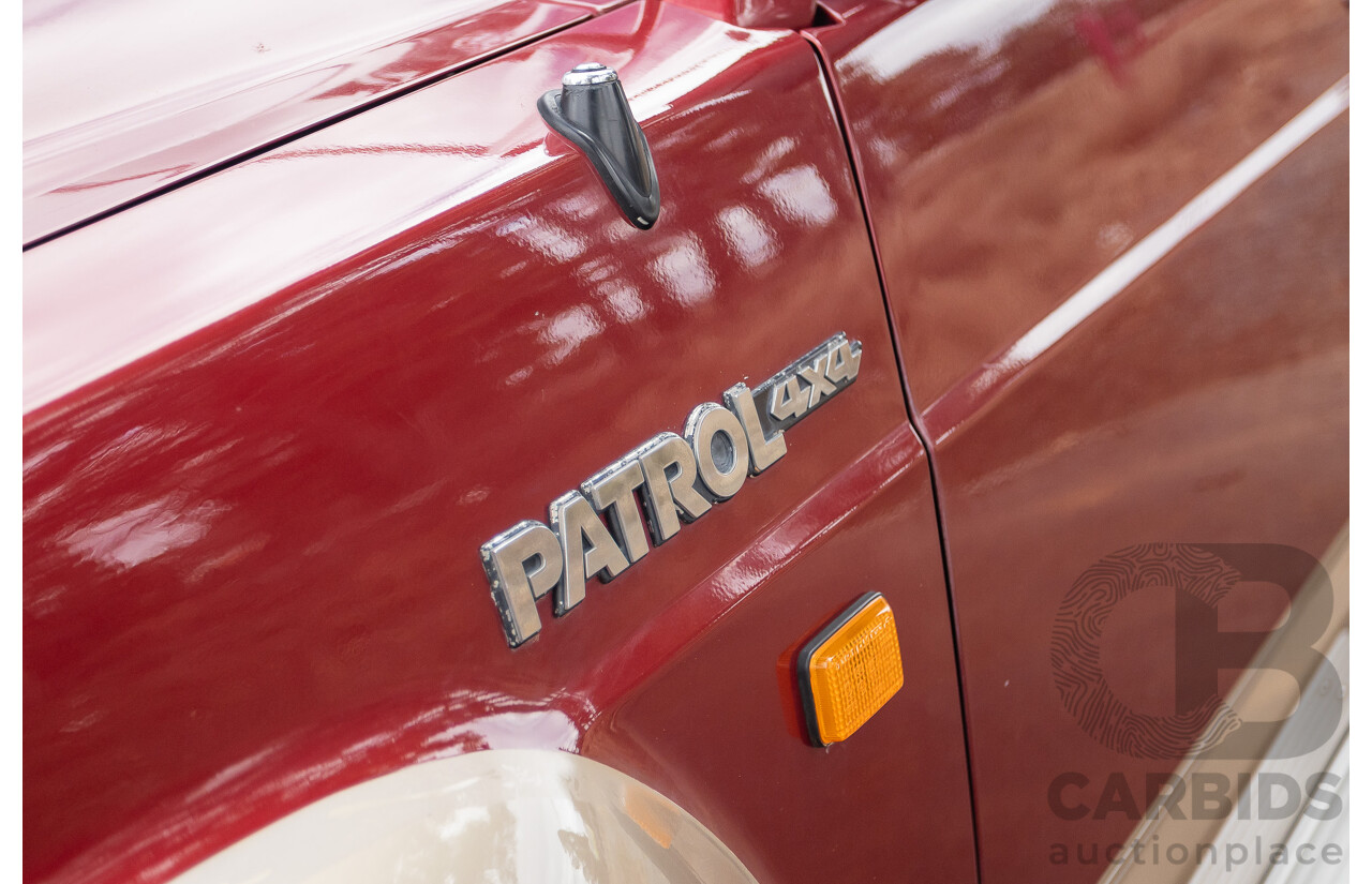 10/1994 Nissan Patrol ST SWB Series 2 (4x4) KY60 GQ 2d Hardtop Big Red / Desert Sand 4.2L