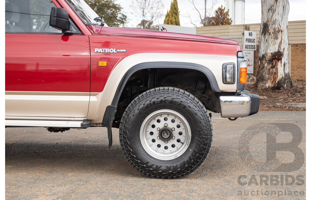 10/1994 Nissan Patrol ST SWB Series 2 (4x4) KY60 GQ 2d Hardtop Big Red / Desert Sand 4.2L
