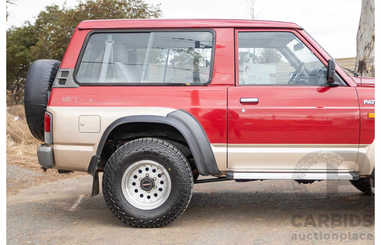10/1994 Nissan Patrol ST SWB Series 2 (4x4) KY60 GQ 2d Hardtop Big Red / Desert Sand 4.2L