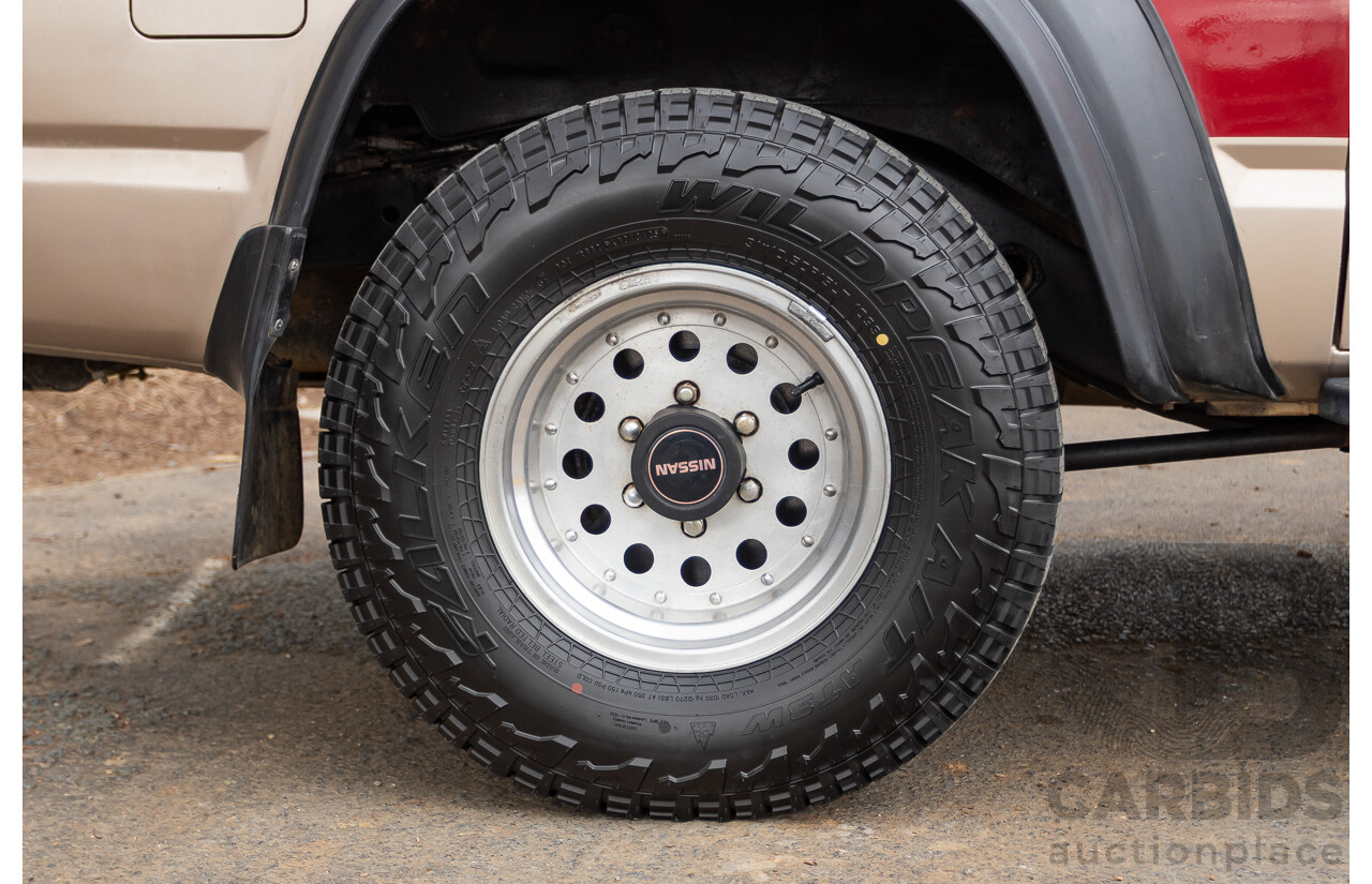 10/1994 Nissan Patrol ST SWB Series 2 (4x4) KY60 GQ 2d Hardtop Big Red / Desert Sand 4.2L