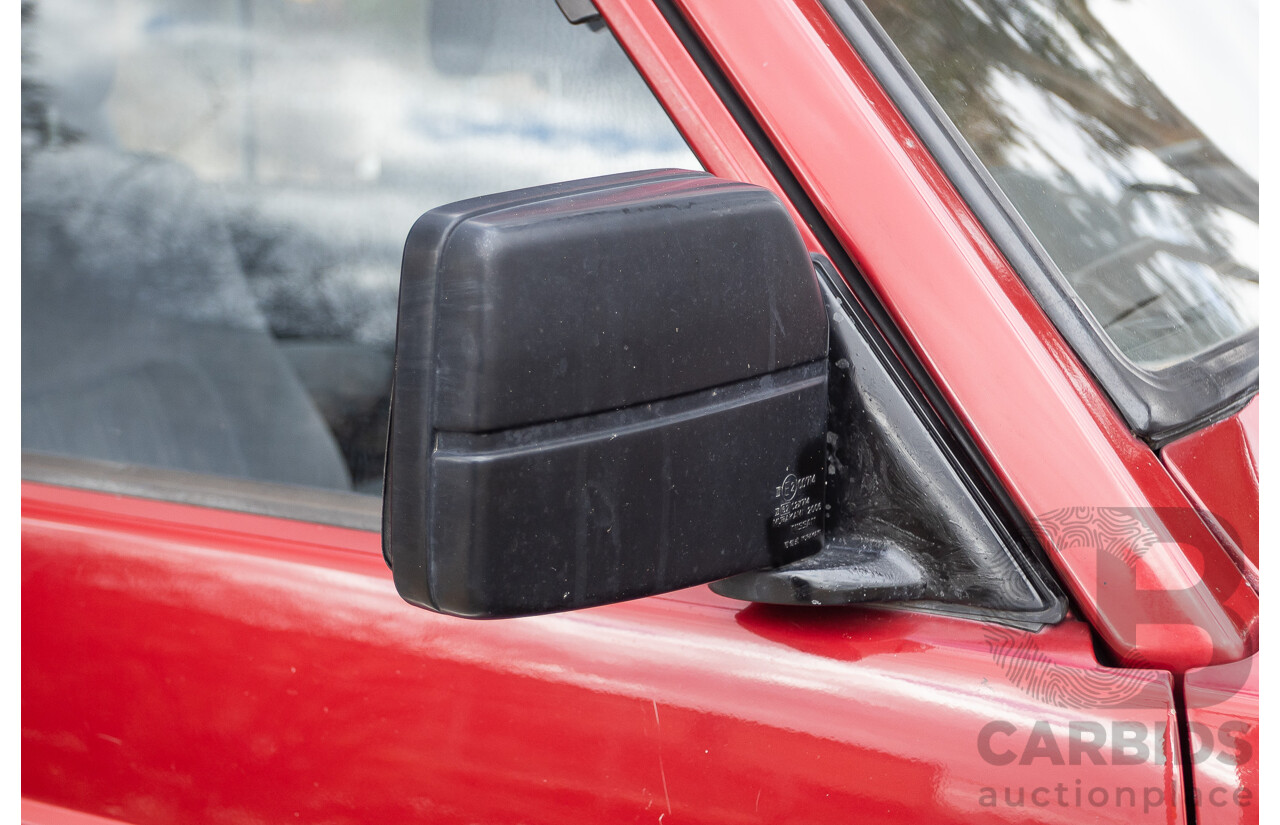 10/1994 Nissan Patrol ST SWB Series 2 (4x4) KY60 GQ 2d Hardtop Big Red / Desert Sand 4.2L