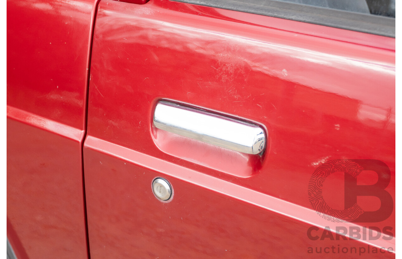 10/1994 Nissan Patrol ST SWB Series 2 (4x4) KY60 GQ 2d Hardtop Big Red / Desert Sand 4.2L