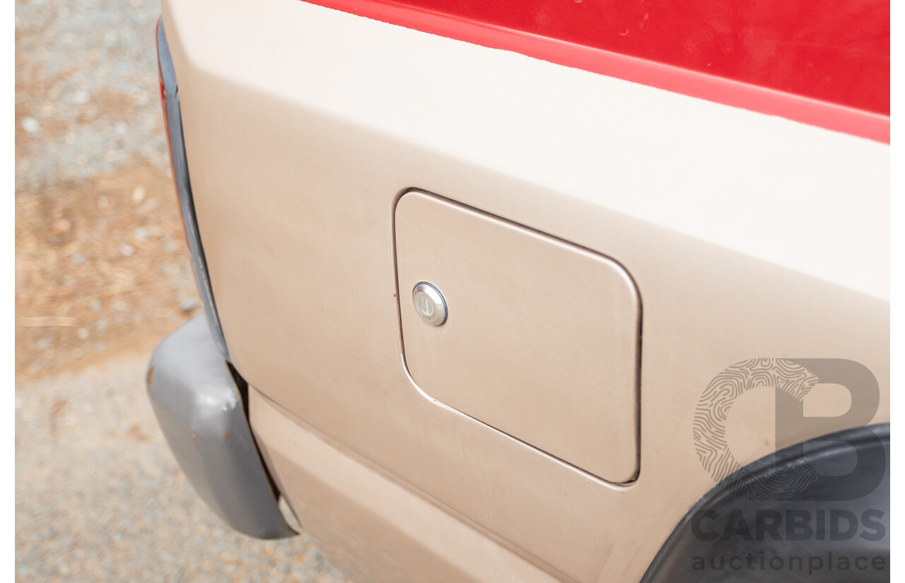 10/1994 Nissan Patrol ST SWB Series 2 (4x4) KY60 GQ 2d Hardtop Big Red / Desert Sand 4.2L