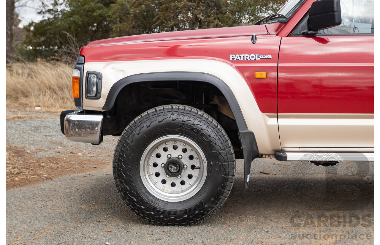 10/1994 Nissan Patrol ST SWB Series 2 (4x4) KY60 GQ 2d Hardtop Big Red / Desert Sand 4.2L