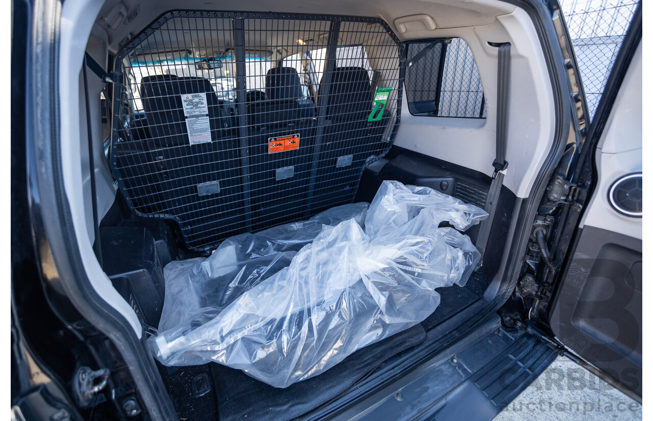 9/2010 Mitsubishi Pajero Platinum Edition NT MY10 4d Wagon Pearl Black Turbo Diesel 3.2L - 7 Seats