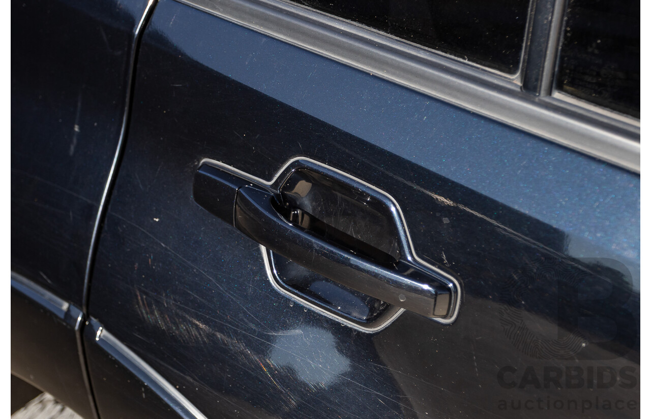 9/2010 Mitsubishi Pajero Platinum Edition NT MY10 4d Wagon Pearl Black Turbo Diesel 3.2L - 7 Seats