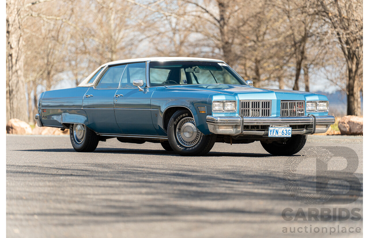 01/1975 Oldsmobile Ninety-Eight 98 Luxury 4d Sedan Specter Blue / White Vinyl V8 455ci V8 7.5L
