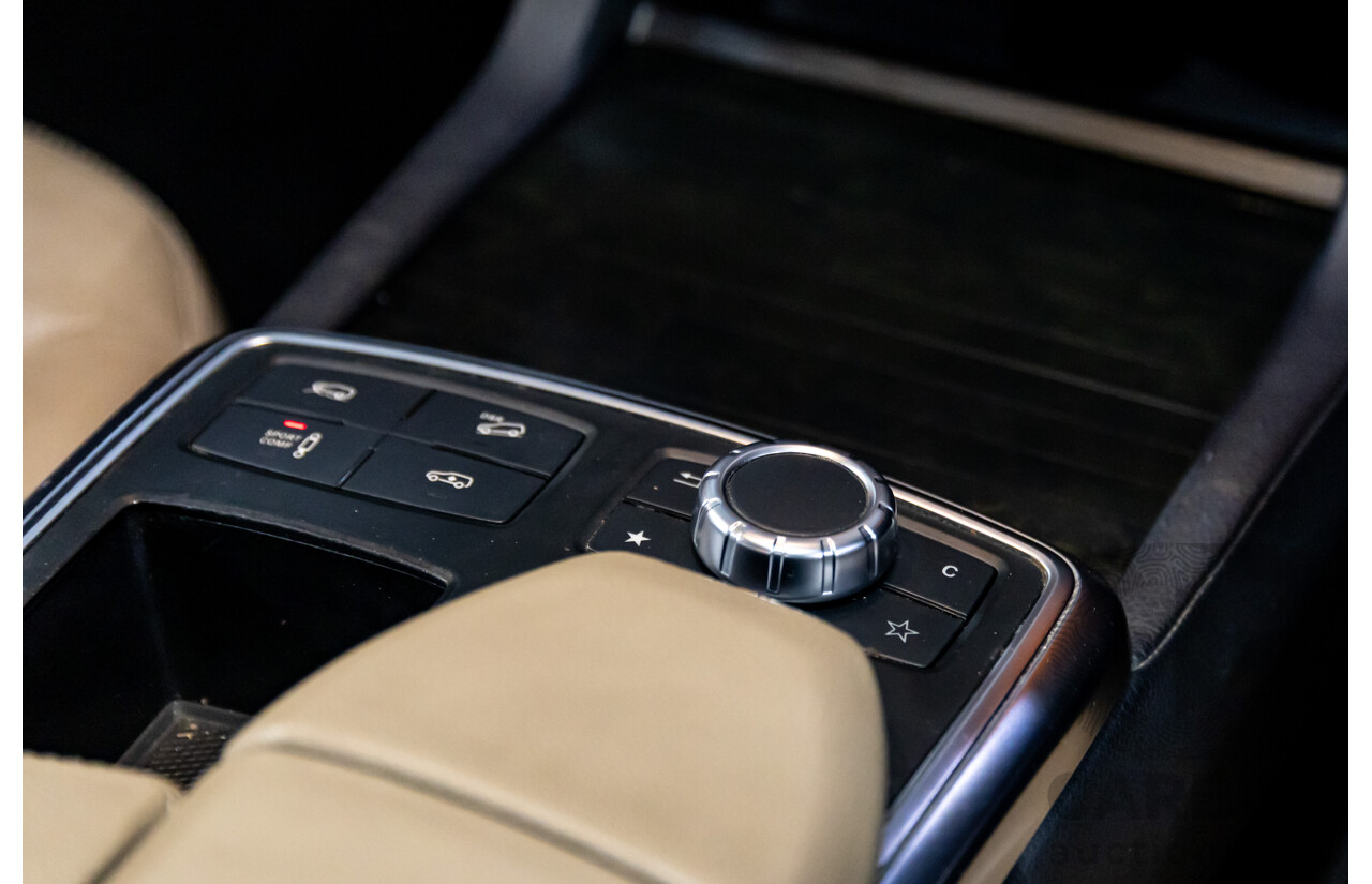 10/2014 Mercedes-Benz ML400 AMG Package (4x4) 166 MY14 4d Wagon Black Obsidian Metallic Twin Turbo V6 3.0L