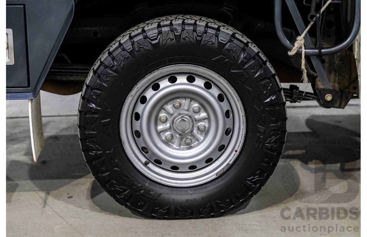 11/2016 Mitsubishi Triton GLX (4x4) MQ MY16 Club C/Chas Solid White Turbo Diesel 2.4L - Custom Tipper Tray