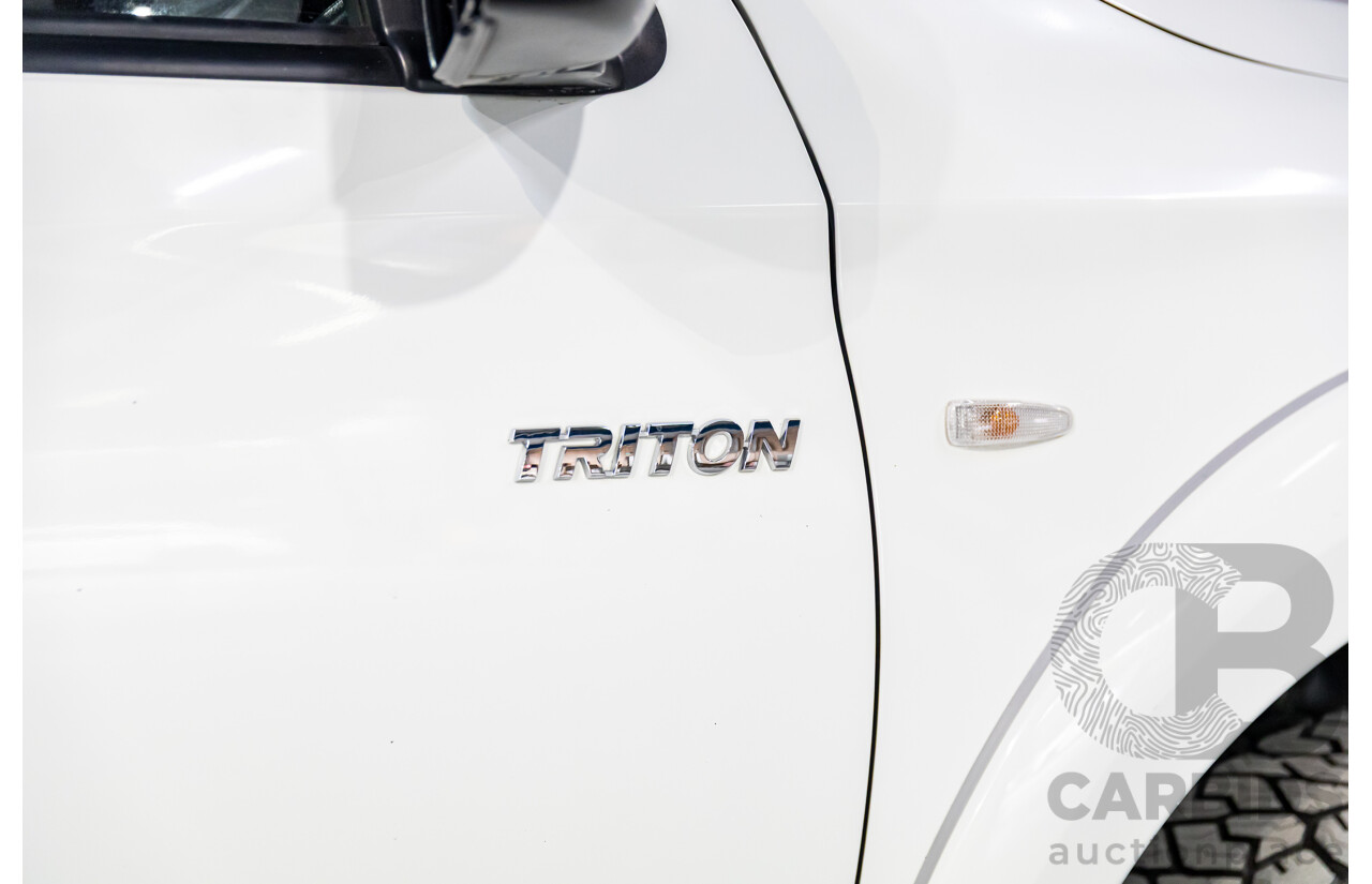 11/2016 Mitsubishi Triton GLX (4x4) MQ MY16 Club C/Chas Solid White Turbo Diesel 2.4L - Custom Tipper Tray