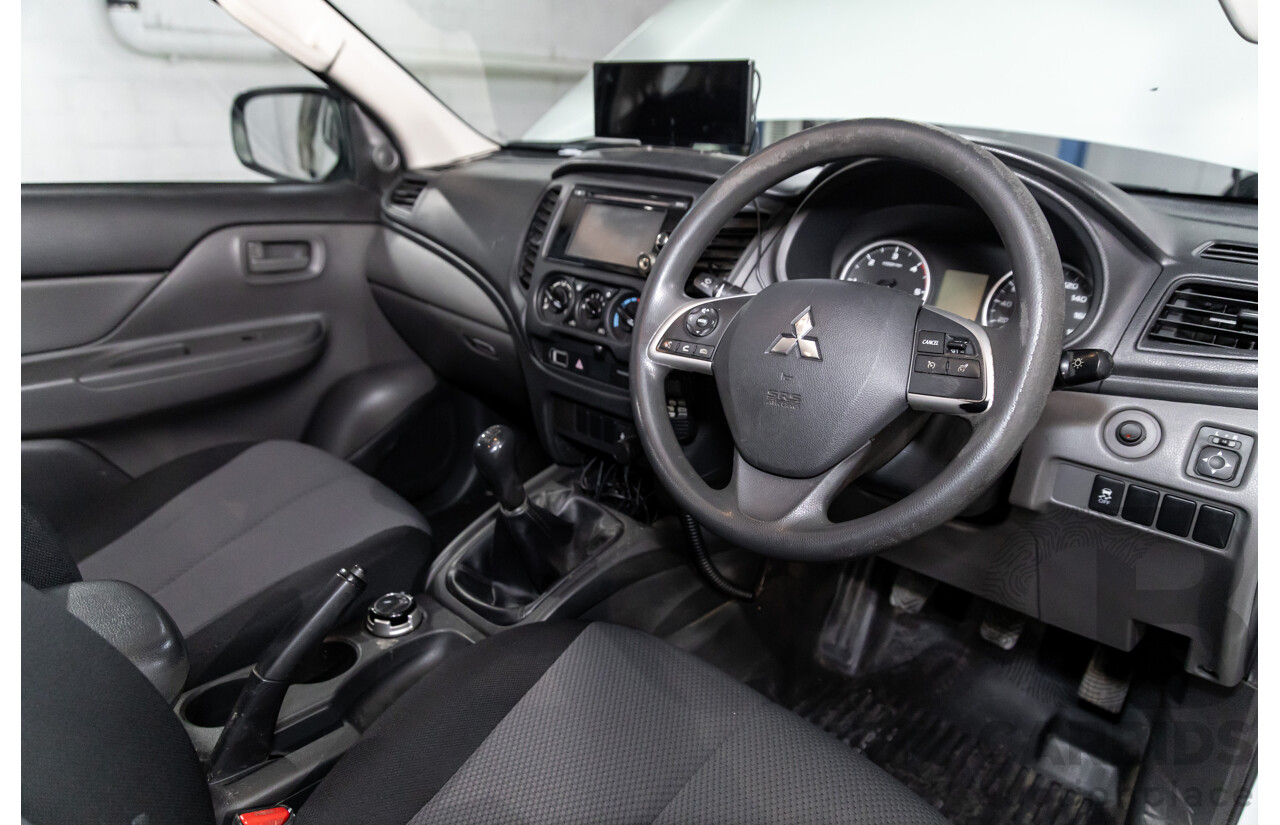 11/2016 Mitsubishi Triton GLX (4x4) MQ MY16 Club C/Chas Solid White Turbo Diesel 2.4L - Custom Tipper Tray