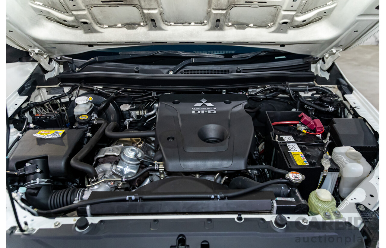 11/2016 Mitsubishi Triton GLX (4x4) MQ MY16 Club C/Chas Solid White Turbo Diesel 2.4L - Custom Tipper Tray