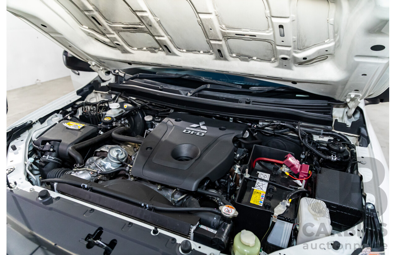 11/2016 Mitsubishi Triton GLX (4x4) MQ MY16 Club C/Chas Solid White Turbo Diesel 2.4L - Custom Tipper Tray