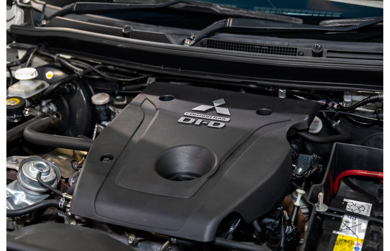 11/2016 Mitsubishi Triton GLX (4x4) MQ MY16 Club C/Chas Solid White Turbo Diesel 2.4L - Custom Tipper Tray