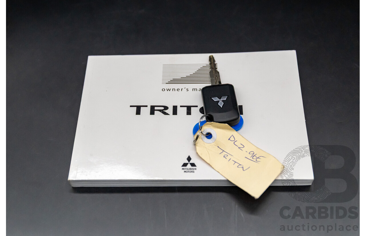 11/2016 Mitsubishi Triton GLX (4x4) MQ MY16 Club C/Chas Solid White Turbo Diesel 2.4L - Custom Tipper Tray