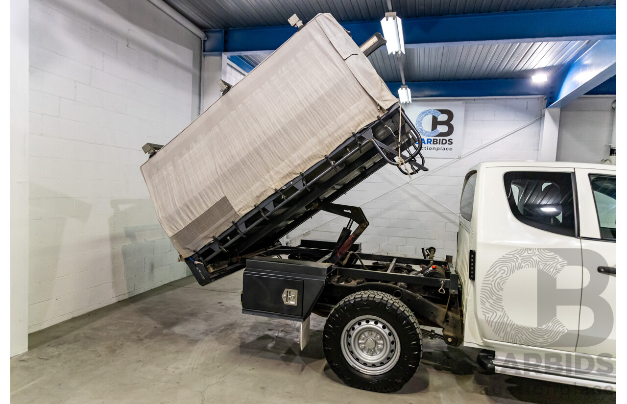 11/2016 Mitsubishi Triton GLX (4x4) MQ MY16 Club C/Chas Solid White Turbo Diesel 2.4L - Custom Tipper Tray