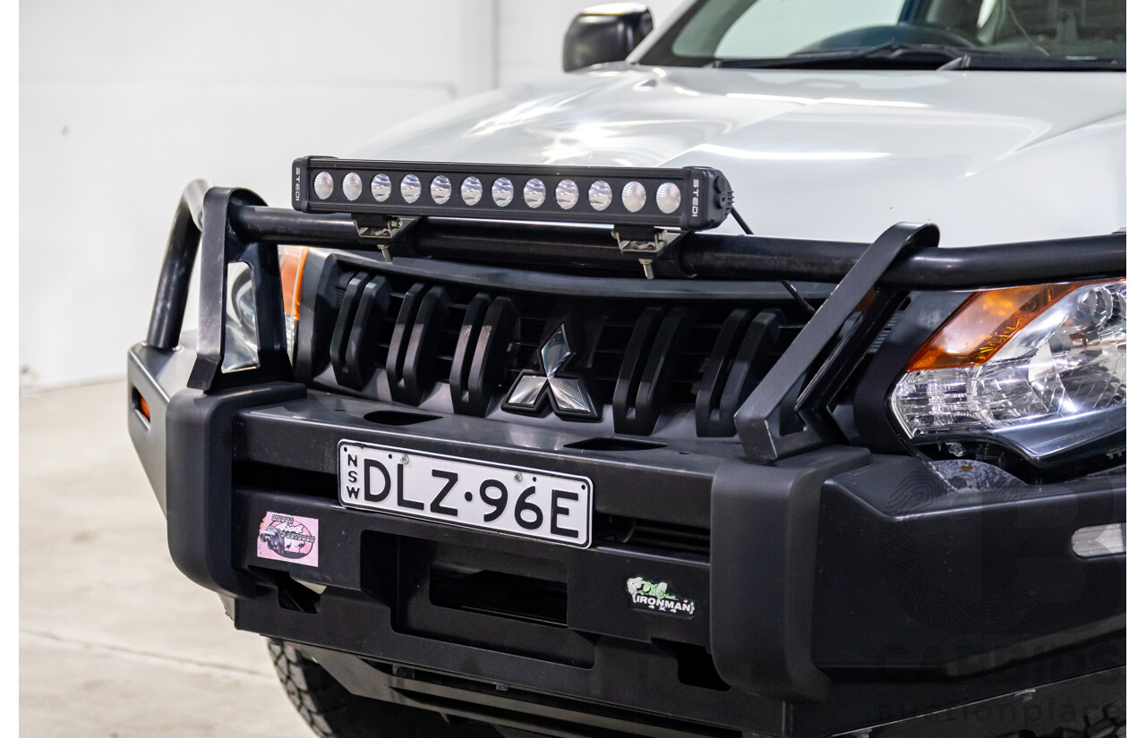 11/2016 Mitsubishi Triton GLX (4x4) MQ MY16 Club C/Chas Solid White Turbo Diesel 2.4L - Custom Tipper Tray