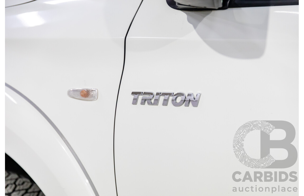 11/2016 Mitsubishi Triton GLX (4x4) MQ MY16 Club C/Chas Solid White Turbo Diesel 2.4L - Custom Tipper Tray