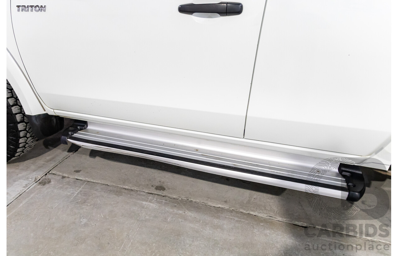 11/2016 Mitsubishi Triton GLX (4x4) MQ MY16 Club C/Chas Solid White Turbo Diesel 2.4L - Custom Tipper Tray