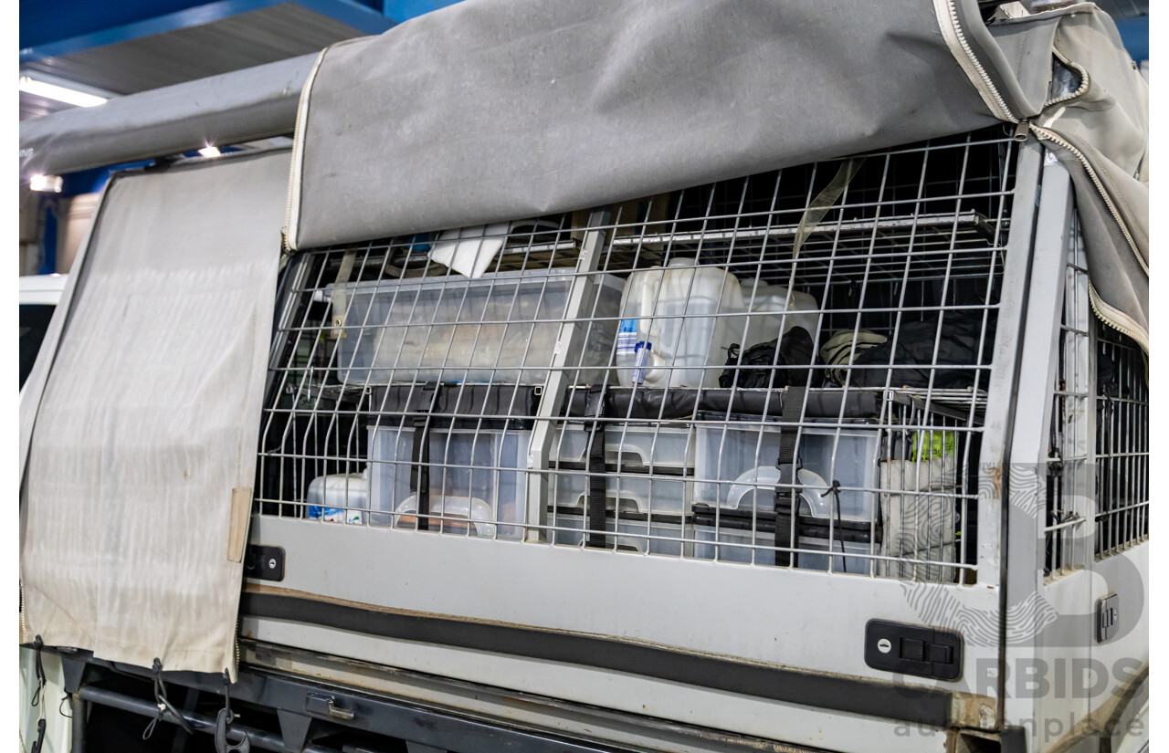 11/2016 Mitsubishi Triton GLX (4x4) MQ MY16 Club C/Chas Solid White Turbo Diesel 2.4L - Custom Tipper Tray