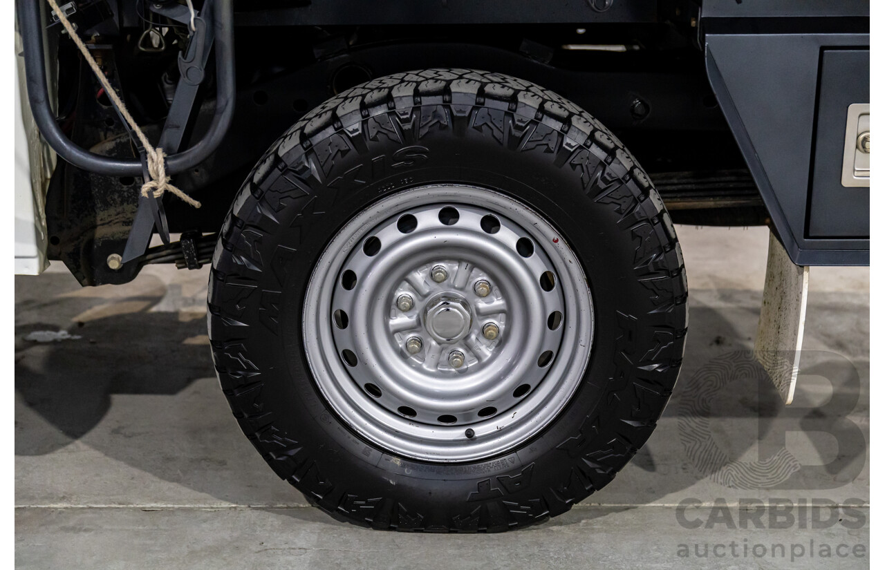 11/2016 Mitsubishi Triton GLX (4x4) MQ MY16 Club C/Chas Solid White Turbo Diesel 2.4L - Custom Tipper Tray