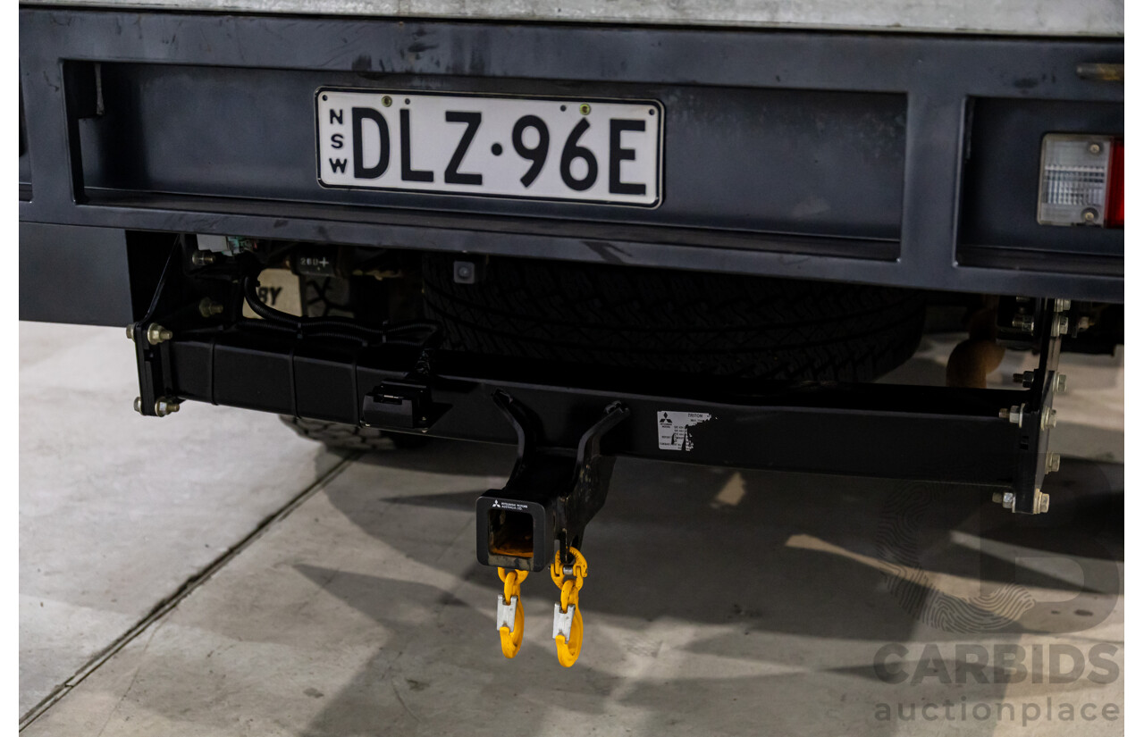 11/2016 Mitsubishi Triton GLX (4x4) MQ MY16 Club C/Chas Solid White Turbo Diesel 2.4L - Custom Tipper Tray