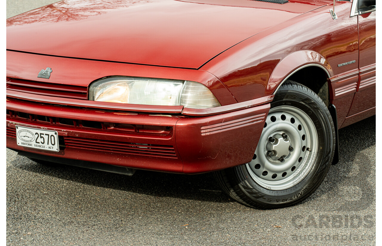 5/1988 Holden Commodore Executive VL BT-1 4d Sedan Venetian Red 3.0L - Ex-NSW Police