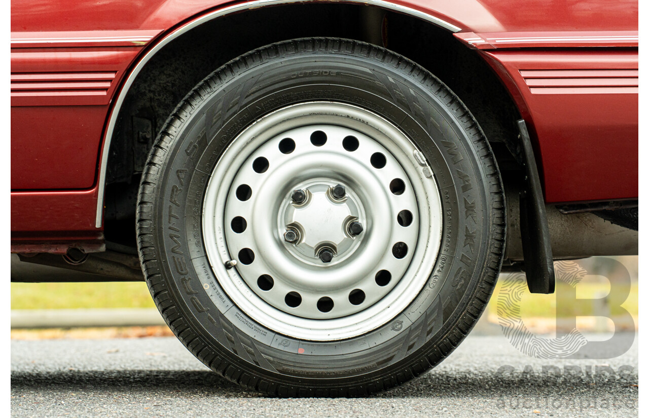 5/1988 Holden Commodore Executive VL BT-1 4d Sedan Venetian Red 3.0L - Ex-NSW Police