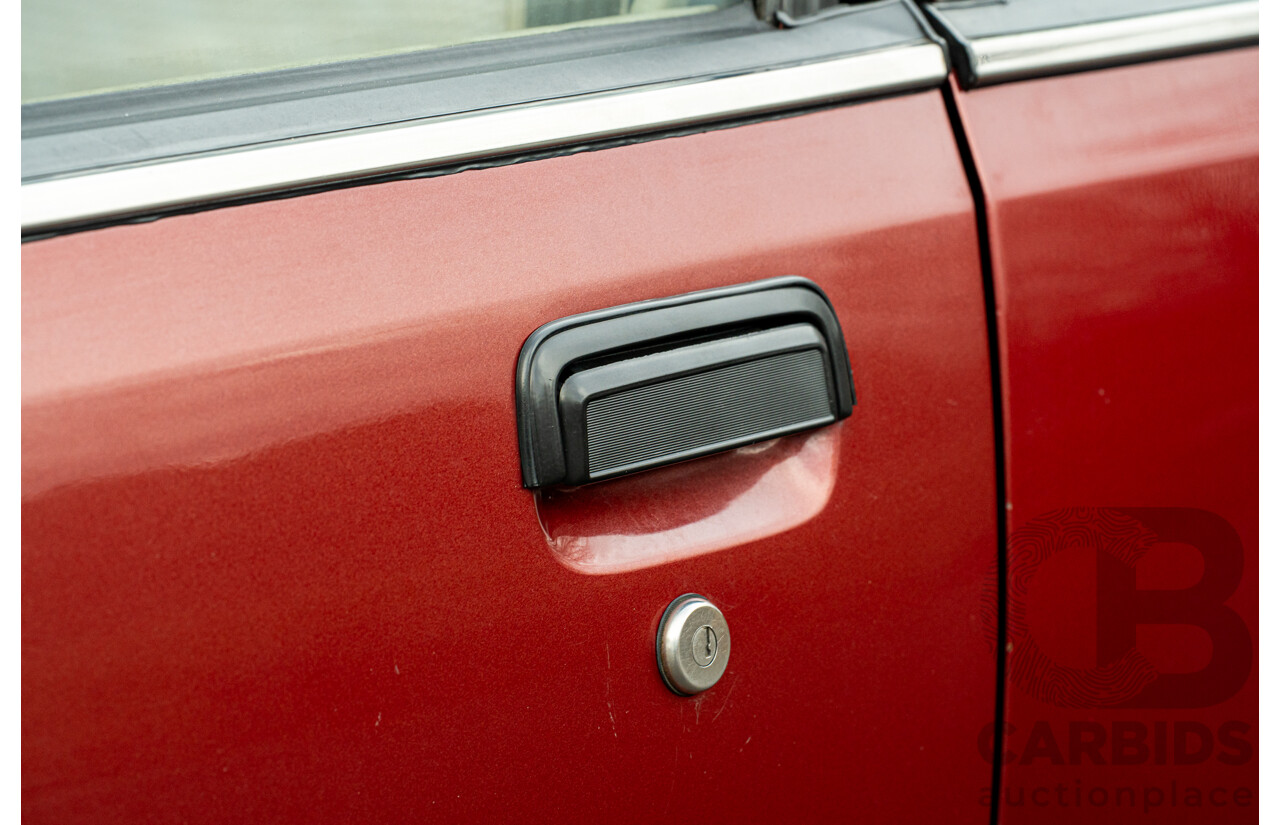 5/1988 Holden Commodore Executive VL BT-1 4d Sedan Venetian Red 3.0L - Ex-NSW Police