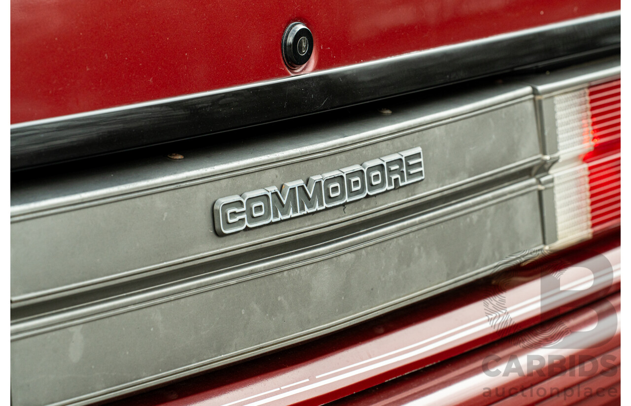 5/1988 Holden Commodore Executive VL BT-1 4d Sedan Venetian Red 3.0L - Ex-NSW Police