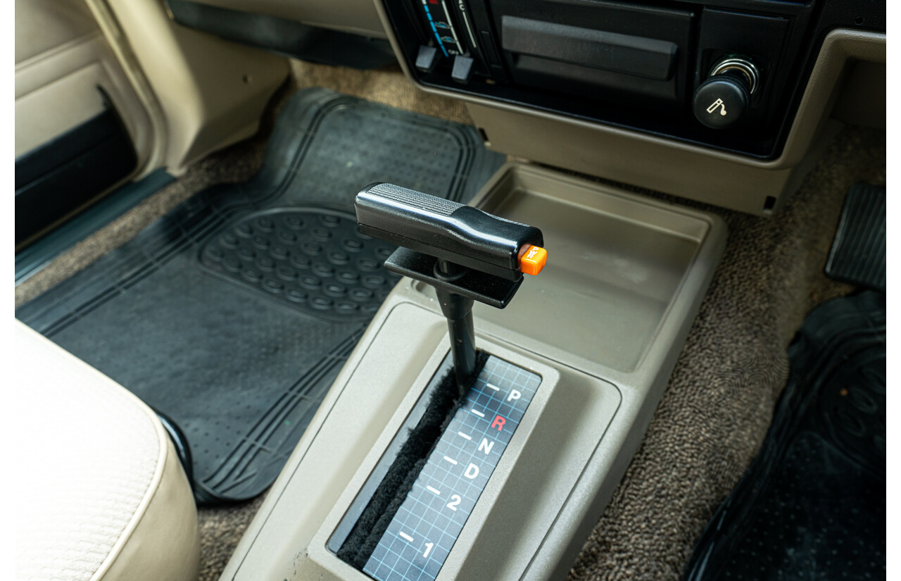 5/1988 Holden Commodore Executive VL BT-1 4d Sedan Venetian Red 3.0L - Ex-NSW Police