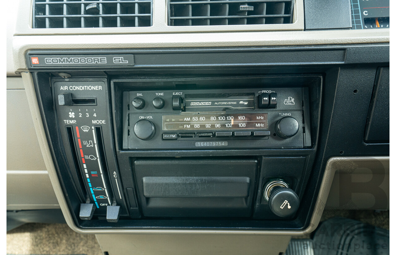 5/1988 Holden Commodore Executive VL BT-1 4d Sedan Venetian Red 3.0L - Ex-NSW Police