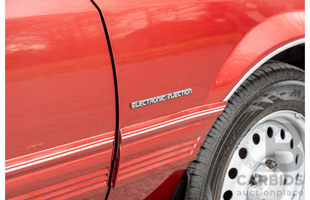 5/1988 Holden Commodore Executive VL BT-1 4d Sedan Venetian Red 3.0L - Ex-NSW Police