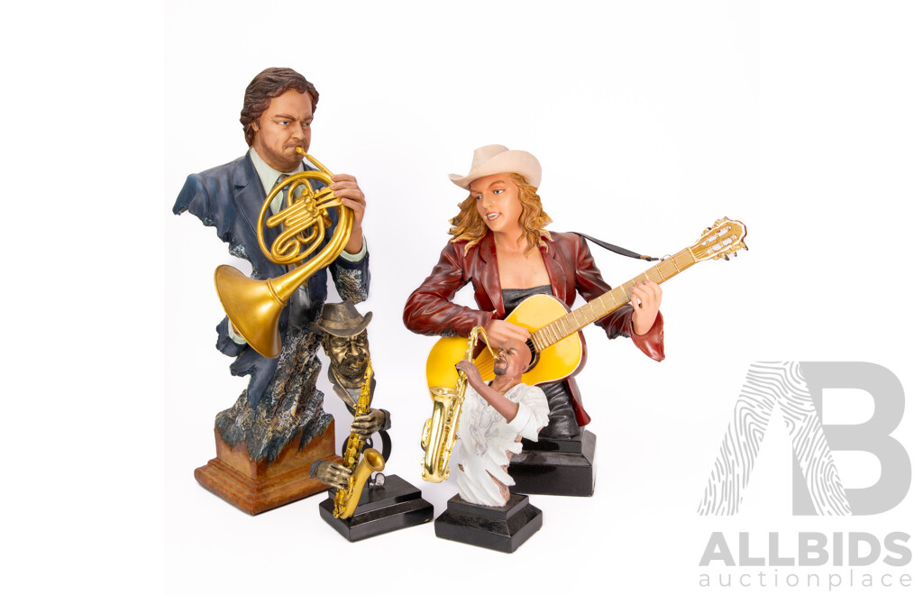 Collection of Four Musician Statues