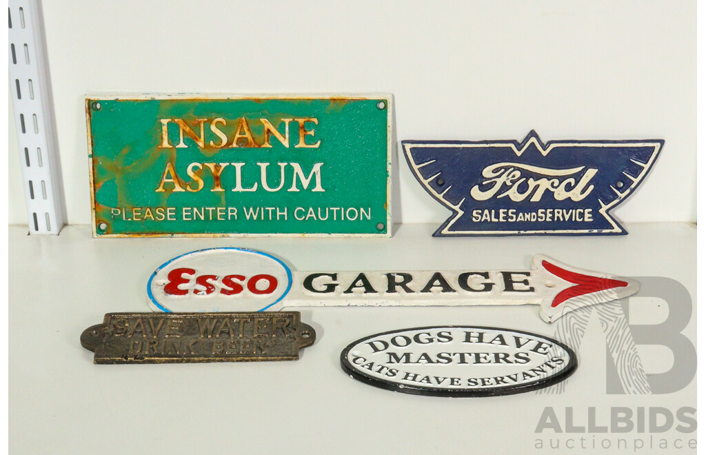 Collection of 5 Cast Iron Signs Including Ford, Esso, Dogs Have Masters, Save Water Drink Beer and Insane Asylum