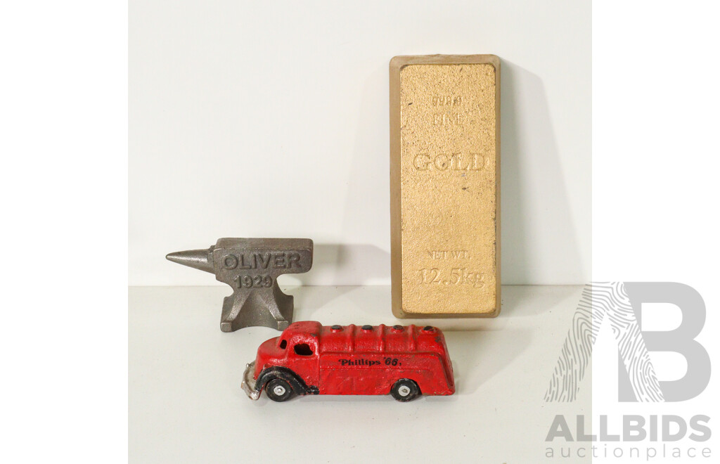 Assorted Cast Iron Pieces Including Gold Bar, Anvil, and Phillips '66 Truck