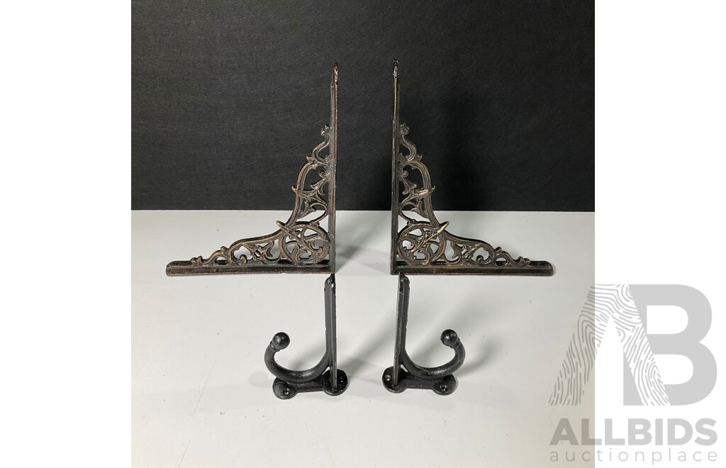 Two Pairs of Cast Iron Wall Mounts