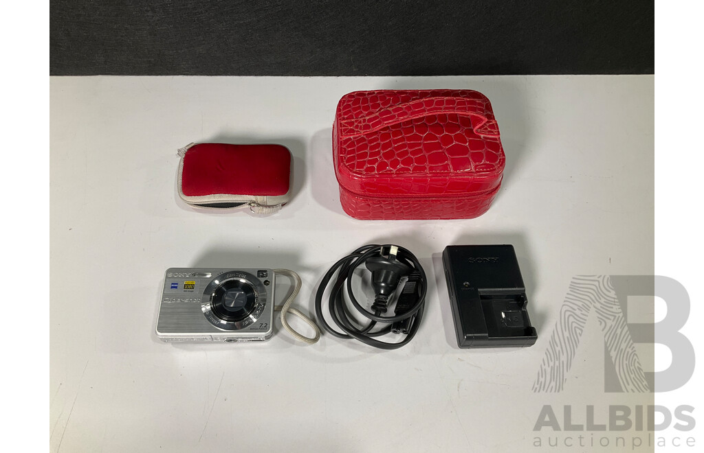 Sony Cyber-shot Camera and Battery Charger in Case