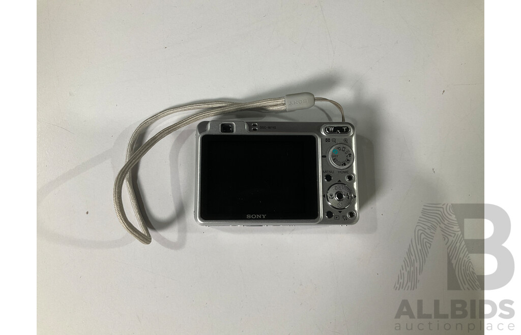 Sony Cyber-shot Camera and Battery Charger in Case