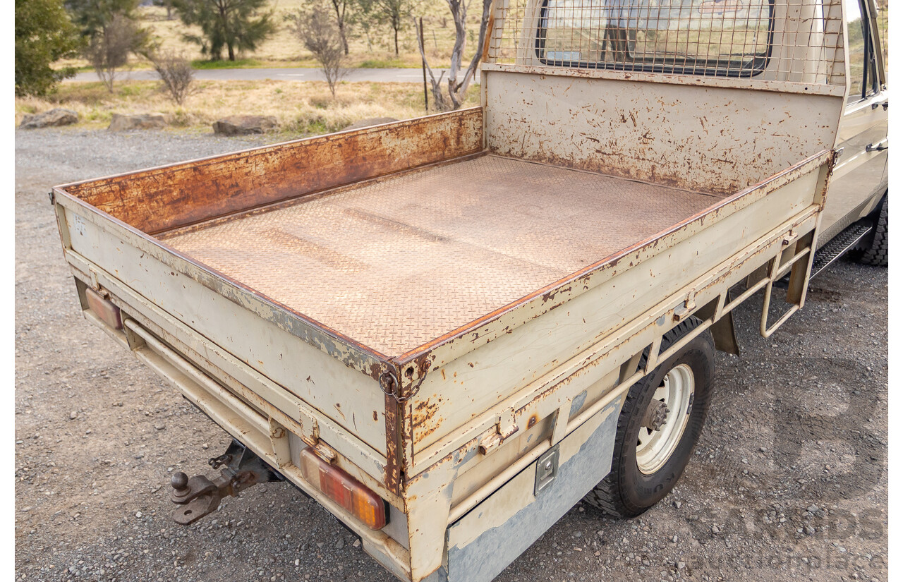 9/1985 Toyota Landcruiser (4x4) HJ75RP 2d C/Chas Goldrush Diesel 4.0L - Tipper