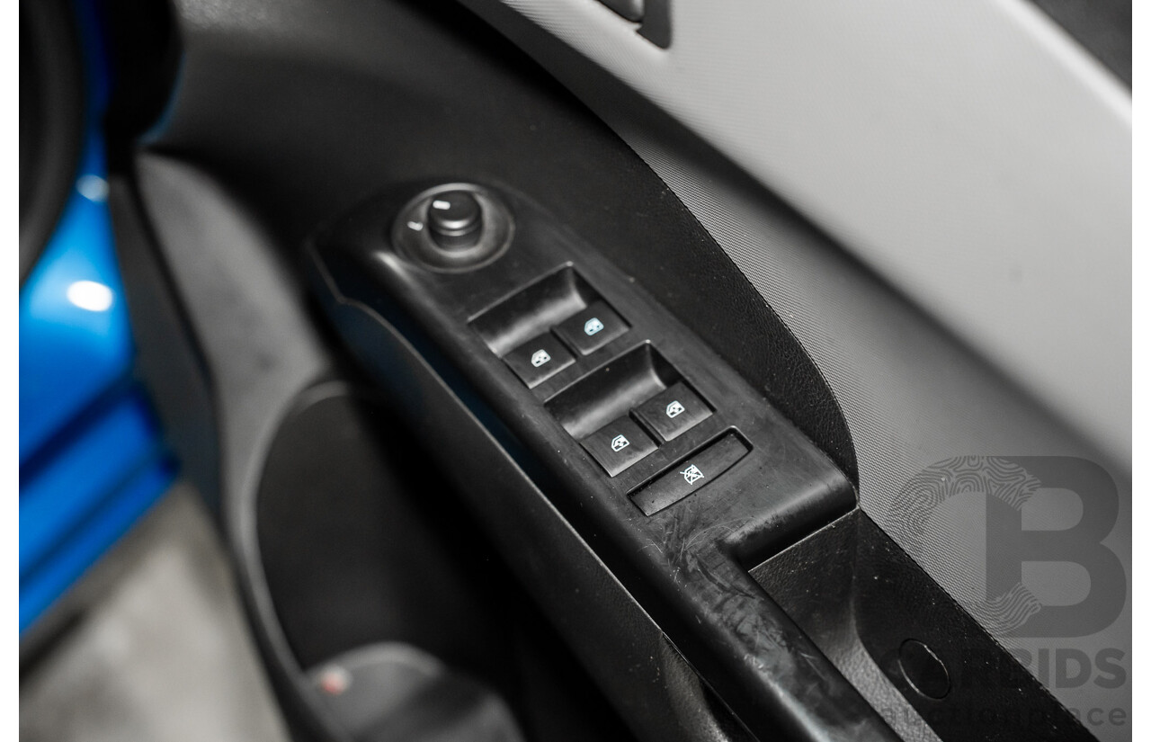 9/2012 Holden Barina TM 5d Hatchback Bocaray Blue Metallic 1.6L